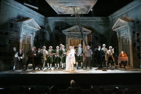 Pamina (Elizabeth Atherton), Richard Coxon (Monostatos), David Stout (Papageno) and the household. Photo © 2007 Alistair Muir