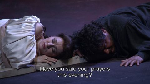 Have you said your prayers this evening? Desdemona (Krassimira Stoyanova), Othello (José Cura) and the broken cross in Act 4. DVD screenshot © 2006 Opus Arte/Gran Teatre del Liceu