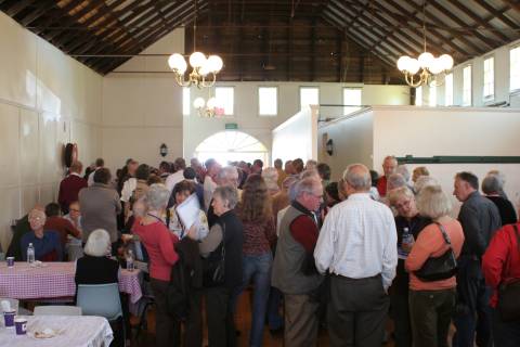 Audience and musicians in Bangalow's Agriculture and Industry Hall 