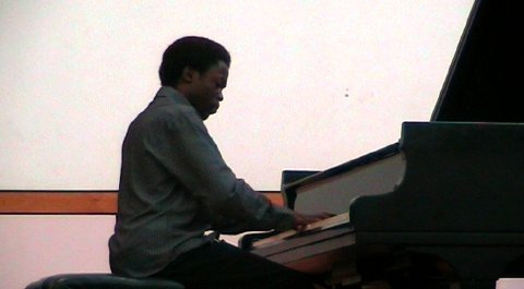Ivan Kiwuwa playing at Regent Hall in London 