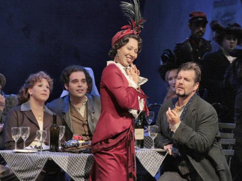 Serena Farnocchia, Dimitri Pittas, Nicole Cabell and James Westman in Act II of 'La bohème'. Photo © 2007 Ken Howard 
