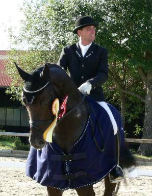 Champion rider and classical music enthusiast: Thann Festival Director Uwe Schwanz (shown here after winning a class at Thann). Photo © 2007 Philip Crebbin 