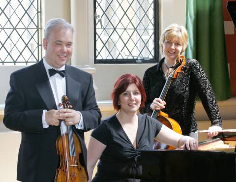The Opus 3 Trio: From left to right, Christopher White, violin, Melanie Reinhard, piano and Jane Odriozolo, cello