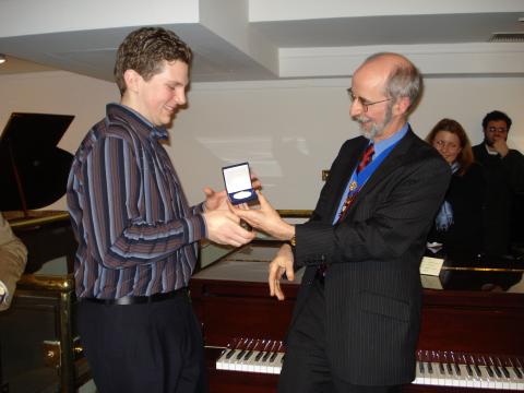 Presentation of the Beethoven medal to BPSE Prize winner Jayson Gillham by Leslie East, master of the Worshipful Company of Musicians. Photo © 2007 F Clarey