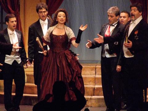 Christin Molnar (The Merry Widow) surrounded by her admirers. Photo © 2007 Robin Grant