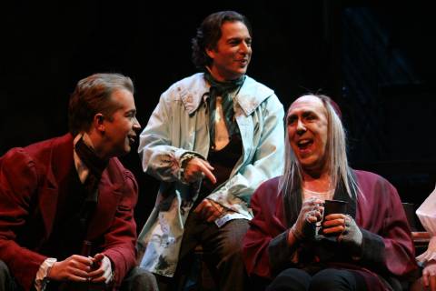 Schaunard (Daniel Okulitch) and Marcello (Jeffery Buchman) laugh at their drunken landlord, Benoit (Jeffery Stevens). Photo © 2007 Victor Massaro 