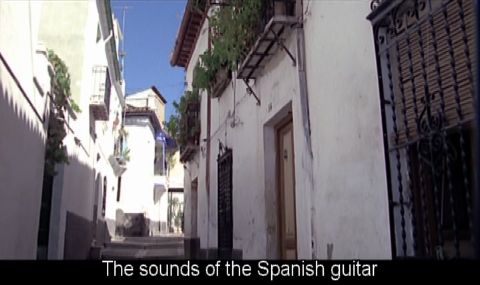 'The sounds of the Spanish guitar have echoed down these streets since the beginnings of Spanish history.' Screenshot © 2005 Opus Arte/Allegro Films 