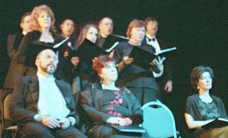 J R Fralich, Madeline Abel-Kerns and Andrea Anelli (front row) with the chorus behind them, in 'Turandot'. Photo © 2008 Kelly Ferjutz