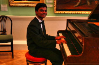 Julian Clef playing at London's Foundling Museum. Photo © 2008 Ronald Stein