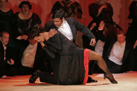 Sean Panikkar as Alfredo and one of the dancers, in the gambling scene (Act II Scene 2) from 'La Traviata'. Photo © 2008 Scott Humbert