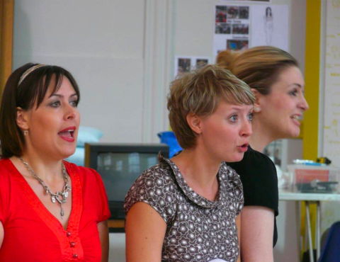Kristen Darragh as the Stewardess, Charlotte Stephenson as the Minskwoman and Emma Carrington as the older woman in rehearsal for Jonathan Dove's 'Flight'