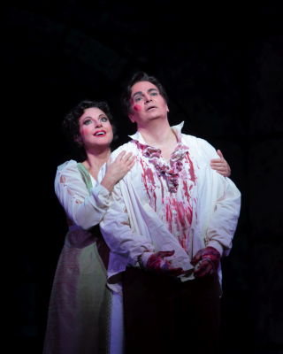 Sylvie Valayre as Floria Tosca and Marcus Haddock as Mario Cavaradossi in San Diego Opera's production of 'Tosca'. Photo © 2009 Ken Howard
