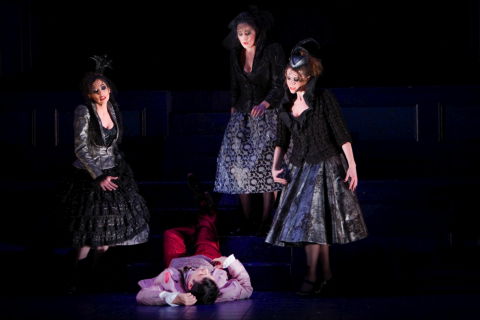 Mark Wilde as Tamino with three ladies in attendance, in English Touring Opera's 'Magic Flute'. Photo © 2009 Robert Workman