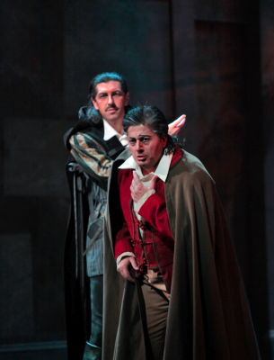 Arutjun Kotchinian as Sparafucile and Lado Ataneli as Rigoletto in San Diego Opera's production of 'Rigoletto'. Photo © 2009 Ken Howard