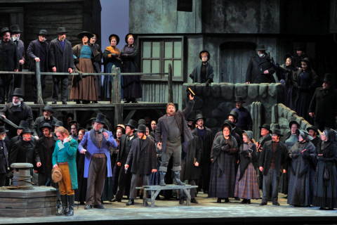 Greg Fedderly as Bob Boles (centre) with the San Diego Opera chorus in 'Peter Grimes'. Photo © 2009 Ken Howard