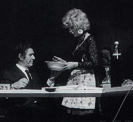 John Cage and Cathy Berberian during the first performance (1970) of part of 'Song Books' (Ninety Solos for Voice). Cathy asks Cage (seated on stage) to sample the spaghetti she has just cooked before carrying it to the audience. Photo © Philippe Gras, courtesy of Cristina Berio: taken from Jennifer Paull's book 'Cathy Berberian and Music's Muses'