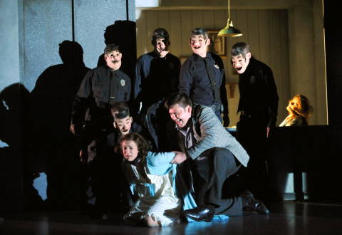 Laura Mitchell as Gilda and chorus, during Gilda's abduction in Act I. Photo © 2009 Alastair Muir