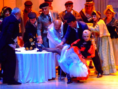 Snejana Dramcheva as Musetta shows a bit of leg in Act II of 'La bohème'. Photo © 2009 Robin Grant