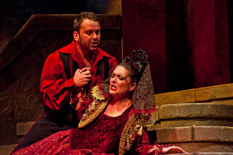 José, Arnold Rutkowski, pleads with Carmen, Viktoria Visin in the Phoenix Opera production of Bizet's 'Carmen'. Photo © 2009 Victor Massaro