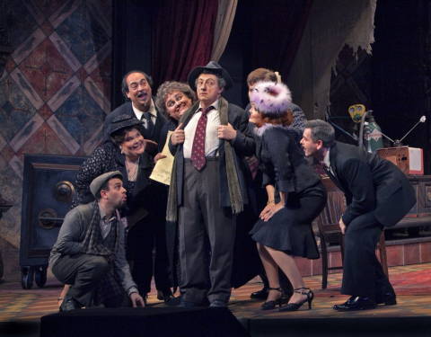 A scene from New York Metropolitan Opera's production of 'Gianni Schicchi' with Patrick Carfizzi as Betto di Signa, Jennifer Check as Nella, Donato Di Stefano as Simone, Stephanie Blythe as Zita, Alessandro Corbelli as Gianni Schicchi, Patricia Risley as Ciesca, Jeff Mattsey (behind Patricia Risley) as Marco, and Keith Jameson as Gherardo. Photo © 2009 Ken Howard